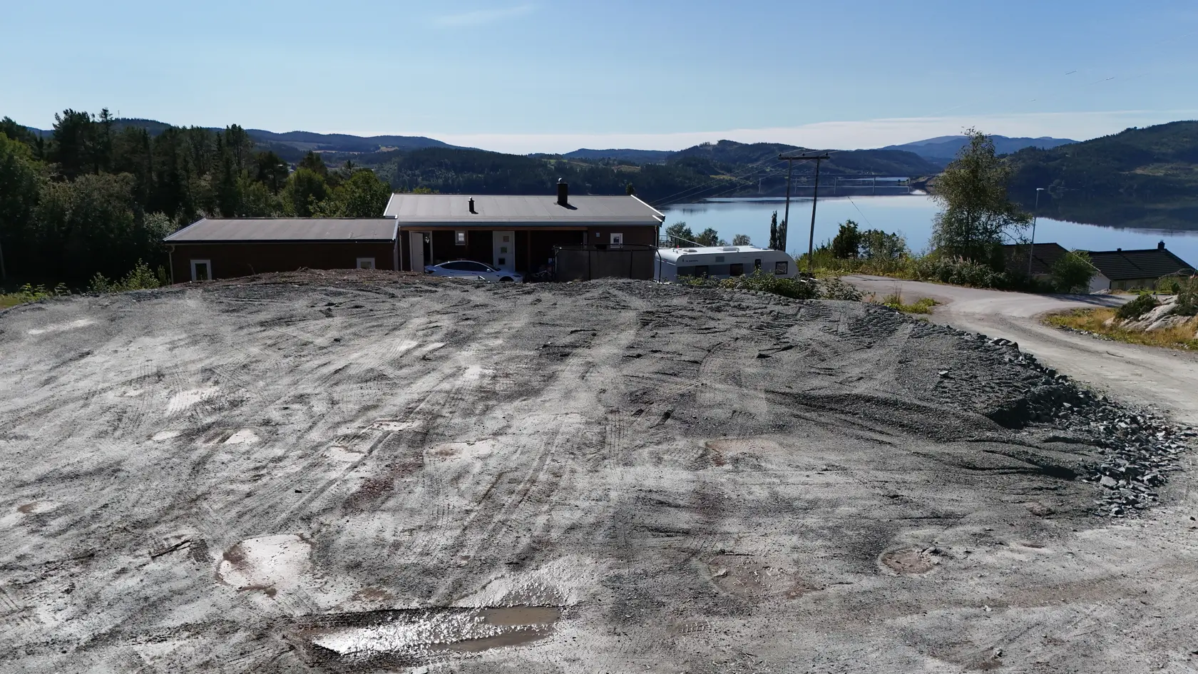 Flott utsiktstomt på 806 kvm innerst i blindvei på Vellamelen. Ingen byggeklausul. Opparbeidet og planert. photo 5